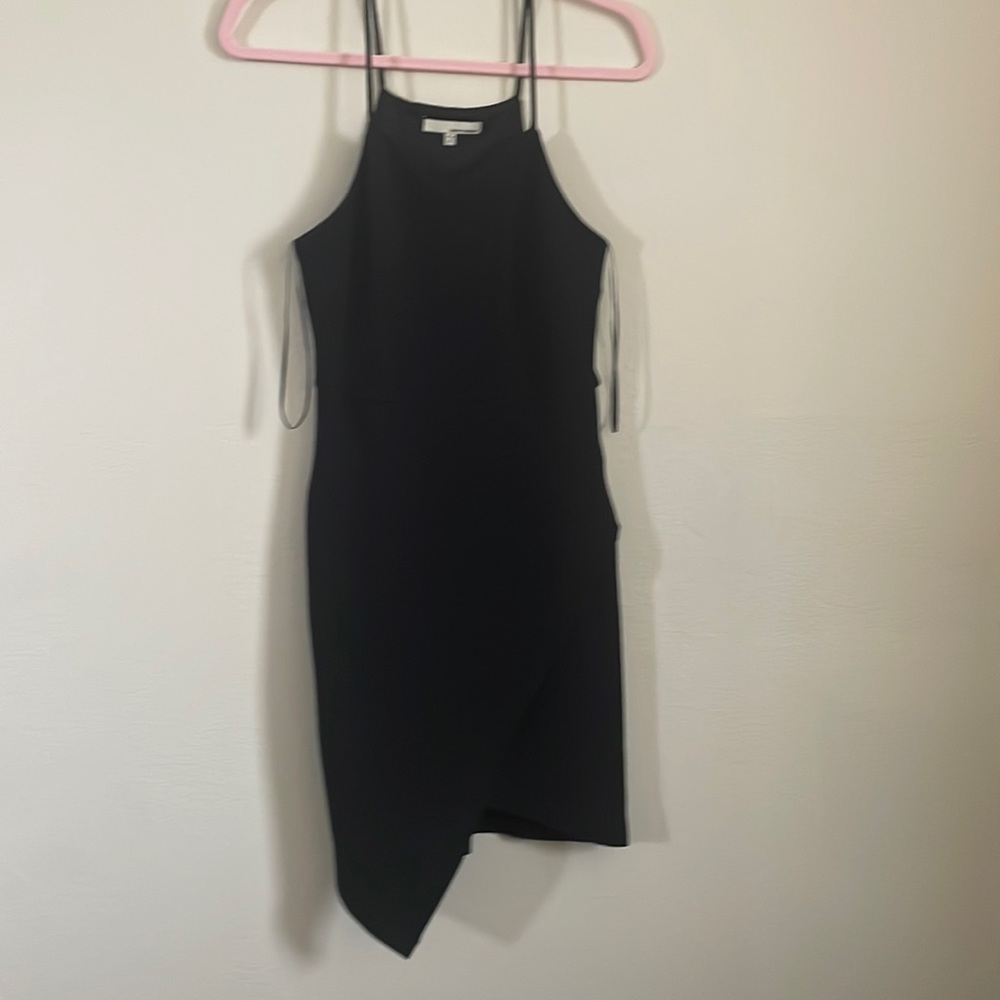 Size S black dress never worn.